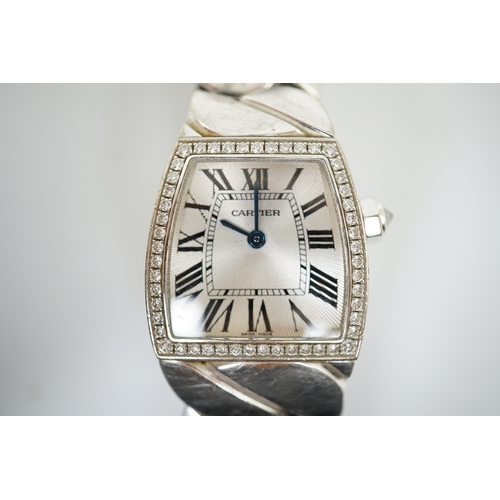 110 - A lady's recent 18ct white gold and diamond set Cartier La Dona quartz wrist watch, on an 18ct white... 