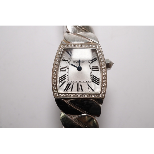 110 - A lady's recent 18ct white gold and diamond set Cartier La Dona quartz wrist watch, on an 18ct white... 