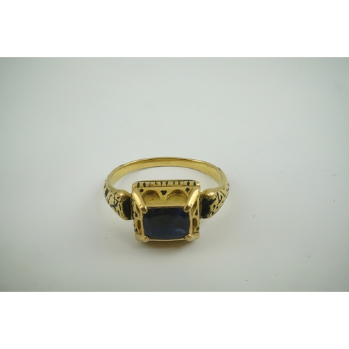 112 - An antique high carat gold, black enamel and later? collet set cushion cut sapphire set 'poison' rin... 