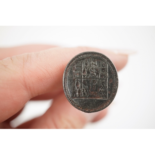 114 - An early 18th century silver and gold signet ring, embossed with an armorial, size R, together with ... 