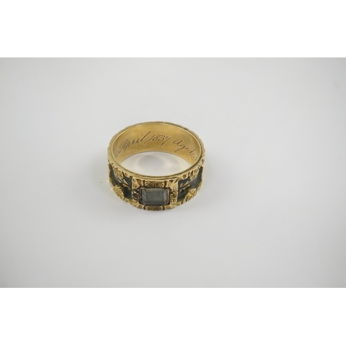 118 - An early Victorian 18ct gold and black enamel initial mourning band, with glazed panel, the interior... 