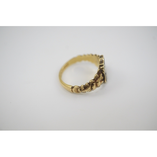 119 - An early Victorian 18ct gold and two colour enamel 'In Memory Of' mourning ring, with carved shoulde... 