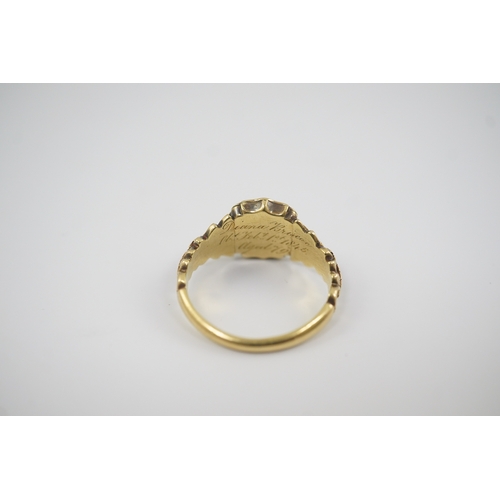 119 - An early Victorian 18ct gold and two colour enamel 'In Memory Of' mourning ring, with carved shoulde... 