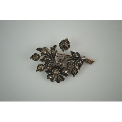 129 - A Victorian gold overlaid silver and rose cut diamond set floral spray brooch, 61mm, gross weight 19... 