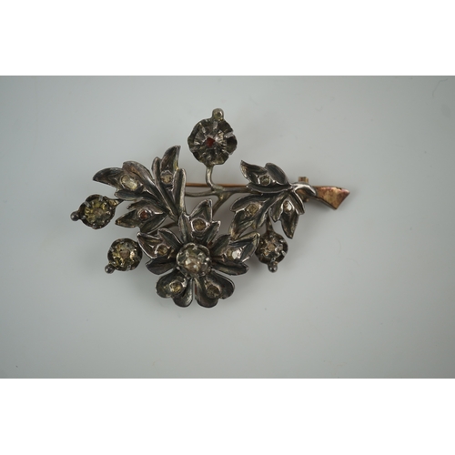 129 - A Victorian gold overlaid silver and rose cut diamond set floral spray brooch, 61mm, gross weight 19... 