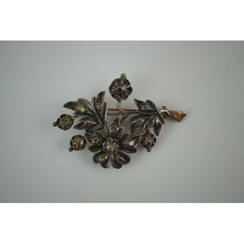 129 - A Victorian gold overlaid silver and rose cut diamond set floral spray brooch, 61mm, gross weight 19... 