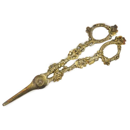 13 - A cased pair of William IV Paul Storr silver gilt grape shears, in later case, with foliate handles,... 