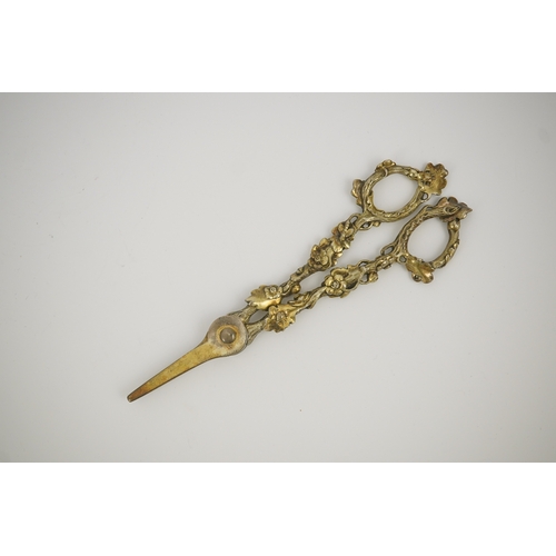 13 - A cased pair of William IV Paul Storr silver gilt grape shears, in later case, with foliate handles,... 