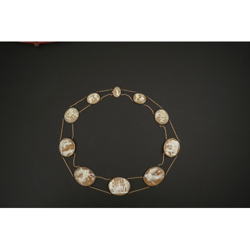 132 - An early 19th century Italian Grand Tour gold double chain link and ten graduated oval cameo shell s... 