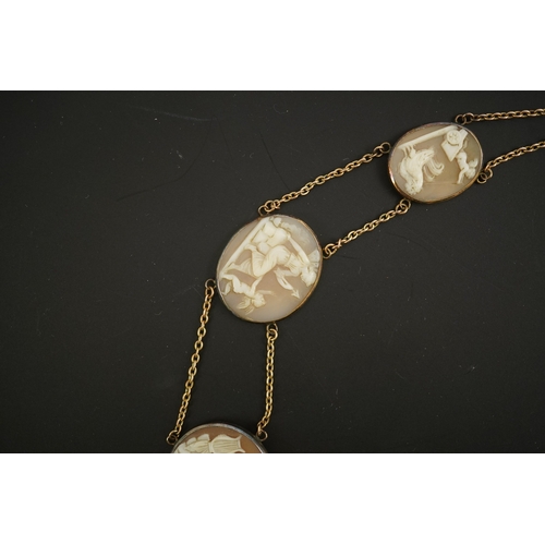 132 - An early 19th century Italian Grand Tour gold double chain link and ten graduated oval cameo shell s... 