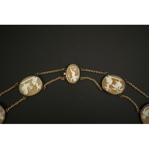 132 - An early 19th century Italian Grand Tour gold double chain link and ten graduated oval cameo shell s... 