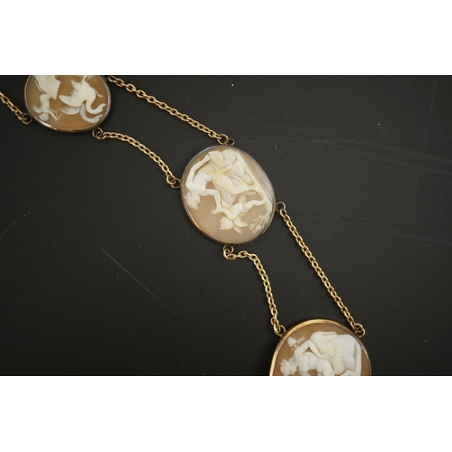 132 - An early 19th century Italian Grand Tour gold double chain link and ten graduated oval cameo shell s... 