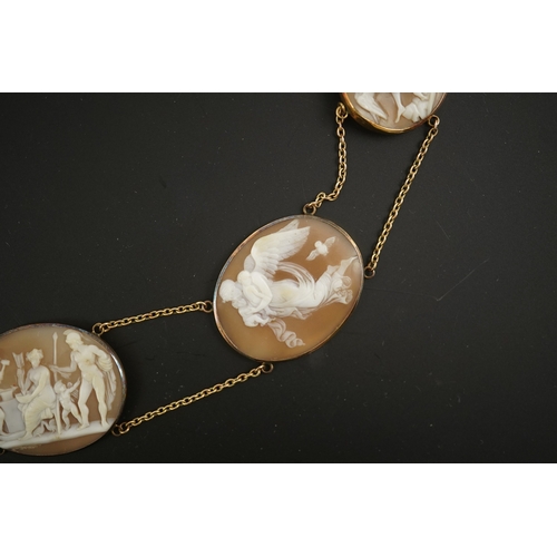 132 - An early 19th century Italian Grand Tour gold double chain link and ten graduated oval cameo shell s... 