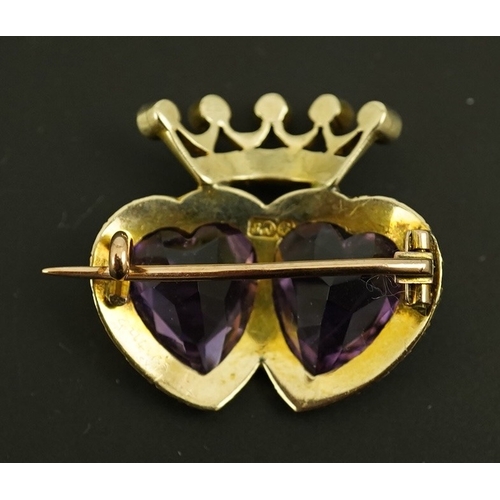 136 - A late Victorian 9ct gold, two stone heart shaped amethyst and seed pearl cluster set coronet brooch... 