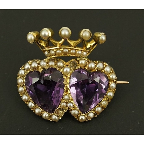 136 - A late Victorian 9ct gold, two stone heart shaped amethyst and seed pearl cluster set coronet brooch... 