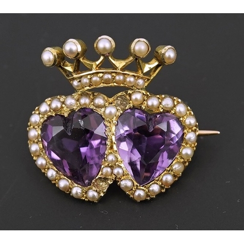 136 - A late Victorian 9ct gold, two stone heart shaped amethyst and seed pearl cluster set coronet brooch... 