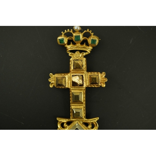 138 - An antique continental engraved gold and seven stone pyrites? set cross pendant, with a gold, emeral... 