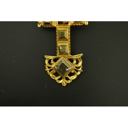 138 - An antique continental engraved gold and seven stone pyrites? set cross pendant, with a gold, emeral... 