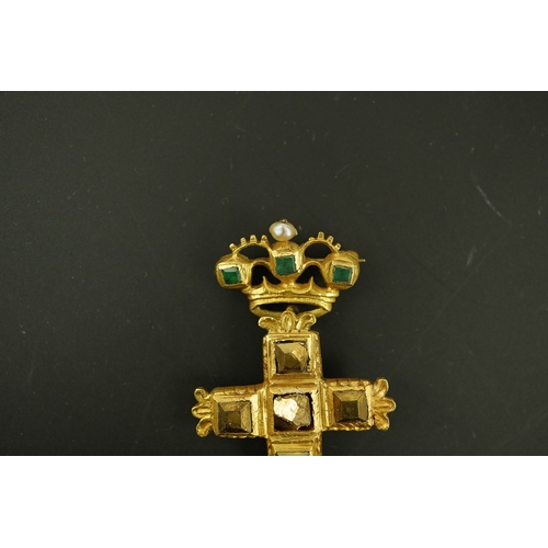 138 - An antique continental engraved gold and seven stone pyrites? set cross pendant, with a gold, emeral... 