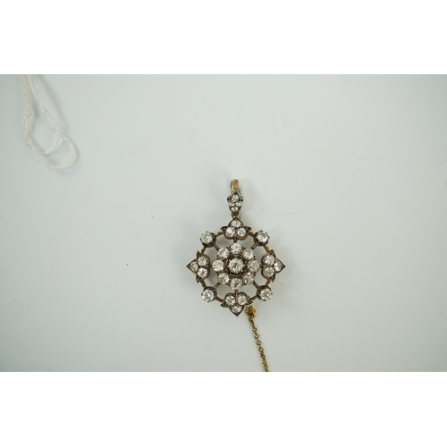 144 - A late Victorian gold, silver and diamond cluster circular pendant brooch, set with old round cut st... 