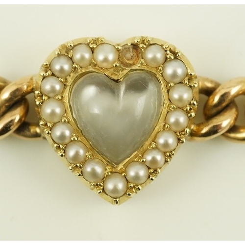 147 - A late Victorian 15ct gold curb link bracelet, with central moonstone and seed pearl set heart shape... 