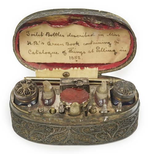 15 - An early 19th century filigree silver writing/etui set, of rectangular form, containing seventeen ac... 