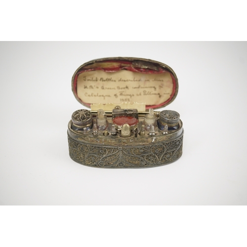 15 - An early 19th century filigree silver writing/etui set, of rectangular form, containing seventeen ac... 