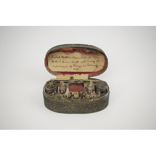 15 - An early 19th century filigree silver writing/etui set, of rectangular form, containing seventeen ac... 