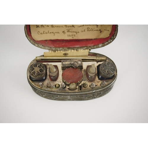 15 - An early 19th century filigree silver writing/etui set, of rectangular form, containing seventeen ac... 