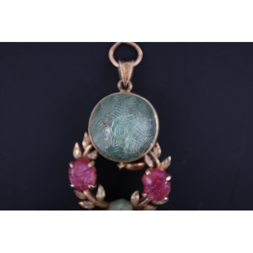 155 - A Mughal style 14k gold mounted green and rose quartz set drop pendant, overall 90mm, gross weight 6... 