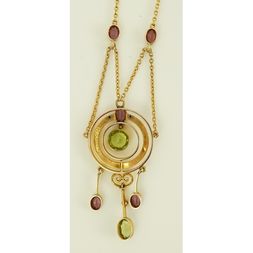 164 - An Edwardian 9ct gold, peridot and garnet set drop pendant necklace, by Murrle Bennett & Co, of targ... 