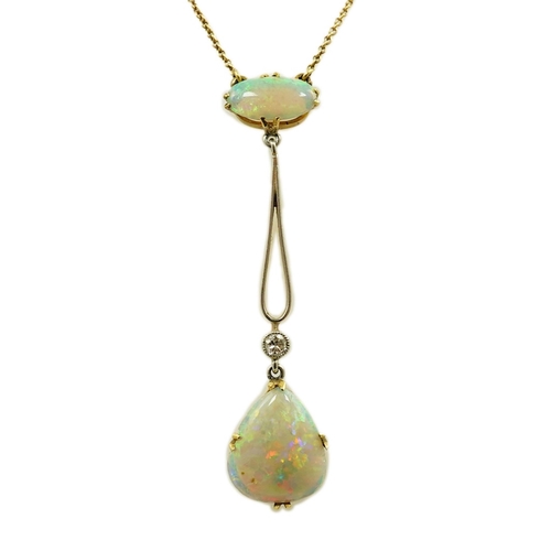 167 - An early 20th century gold, two stone white opal and single stone diamond set drop pendant necklace,... 