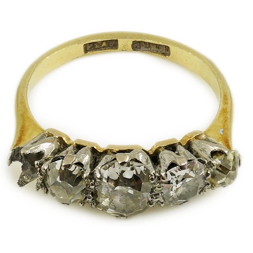 172 - An early 20th century 18ct gold, platinum and graduated five stone old mine cut diamond set half hoo... 