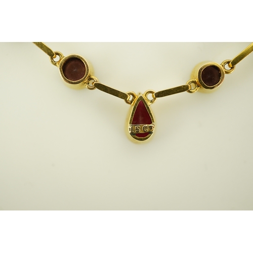 176 - An early 20th century 15ct gold and ten stone multi coloured doublet set necklace, 49cm,  gross weig... 