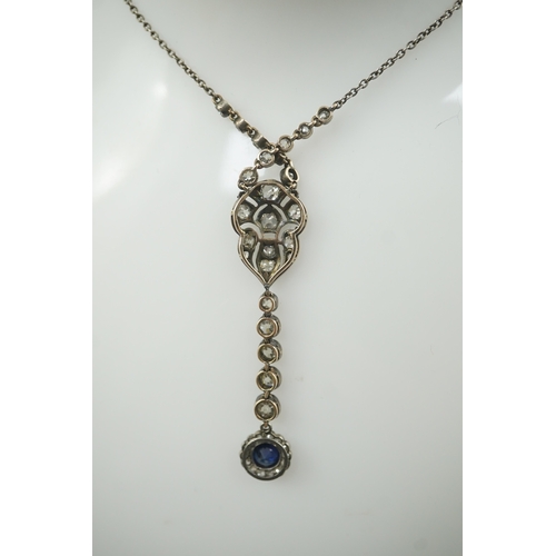 181 - A Belle Epoque gold and silver, millegrain set sapphire and diamond cluster set drop pendant necklac... 