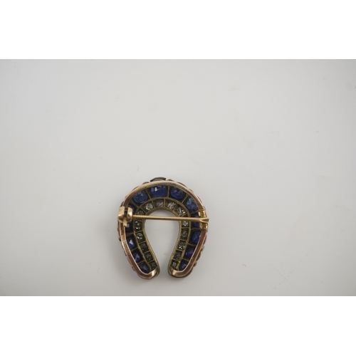 183 - An Edwardian, gold and silver, diamond and sapphire set horse shoe brooch, 24mm, gross weight 4.6 ... 