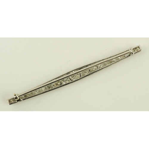 187 - A 1920's platinum? and nineteen millegrain set graduated diamond bar brooch, 59mm, gross weight 4.6 ... 