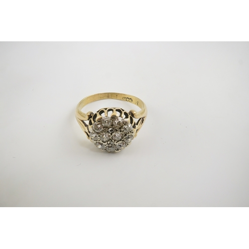 192 - An early to mid 20th century gold and diamond set circular cluster ring, size M/N, gross weight 4.1 ... 