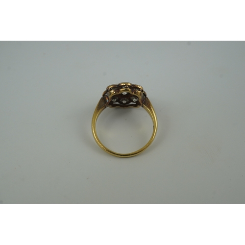 199 - A mid 20th century 18ct gold and nine stone diamond set flower head cluster ring, size L, gross weig... 