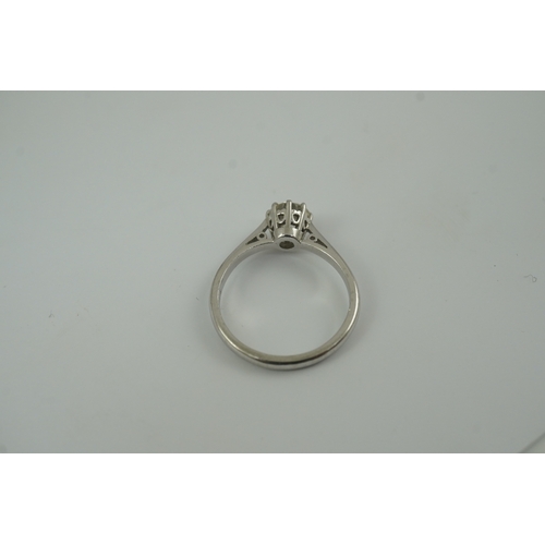 200 - A modern platinum and solitaire diamond set ring, the round brilliant cut stone weighing approximate... 