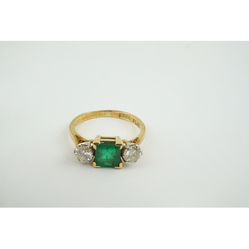 201 - A mid 20th century 18ct gold and platinum, single stone emerald and two stone diamond set ring, size... 