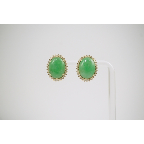 202 - A pair of mid 20th century gold, cabochon jade and diamond cluster set oval earrings, 18mm, gross we... 