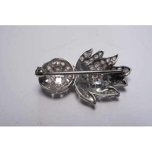 204 - A mid 20th century white gold and pave set diamond Royal Fusiliers sweetheart brooch, 27mm, gross we... 