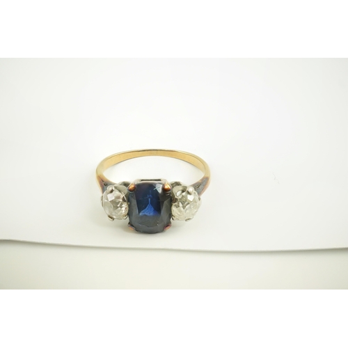 206 - A gold, single stone oval sapphire and two stone round cut diamond set ring, size M, gross weight 2.... 