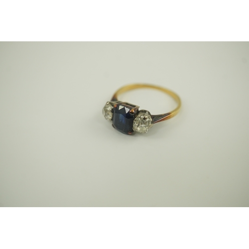 206 - A gold, single stone oval sapphire and two stone round cut diamond set ring, size M, gross weight 2.... 