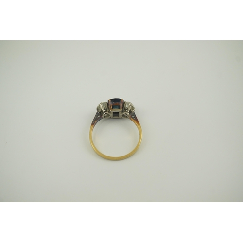 206 - A gold, single stone oval sapphire and two stone round cut diamond set ring, size M, gross weight 2.... 