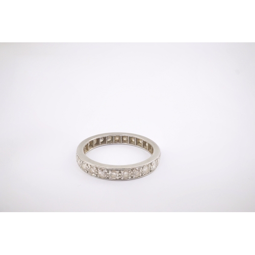 210 - A platinum and diamond set full eternity ring, size N, gross weight 3.6 grams.