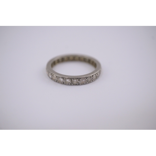 210 - A platinum and diamond set full eternity ring, size N, gross weight 3.6 grams.