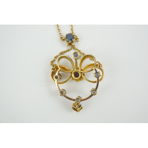 216 - A mid 20th century gold, sapphire and seed pearl cluster set drop pendant necklace, 46cm, gross weig... 