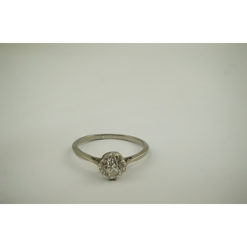 218 - A platinum? and solitaire diamond set ring, the stone weighing approximately 0.90ct, size P/P, gross... 